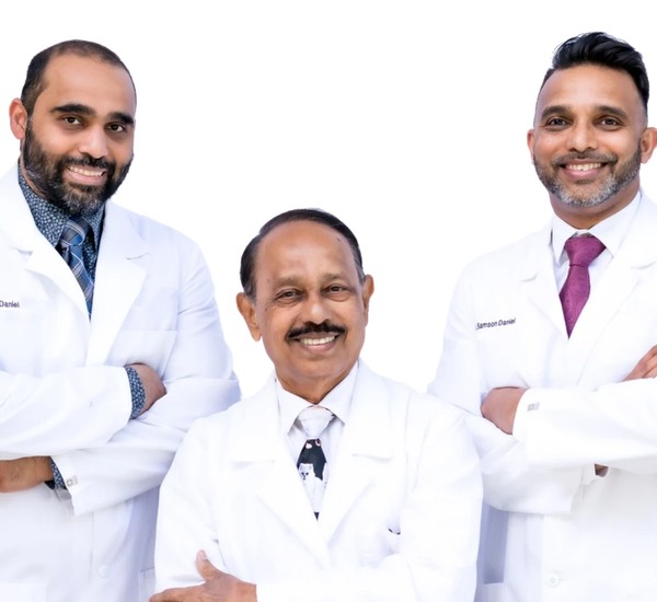two veterinarians looking at a dog
